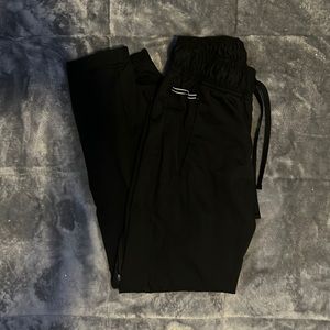 All black (XS) Revolution pants.